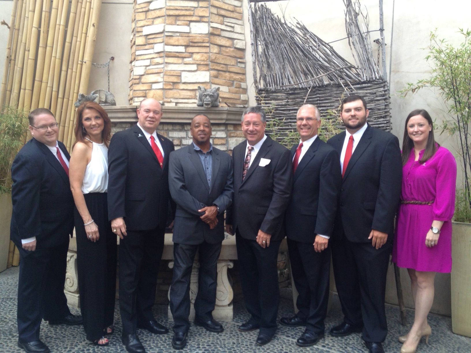 Group Photo Caption: Doug Bradford, Lori Jones, Auctioneer Mike Jones, NBA Great Spud Webb, Mike Weaster, U.S. REO Partners, Montie Davis, Shaun Roberts and Bonne Whittaker, St. Jude/ALSAC.